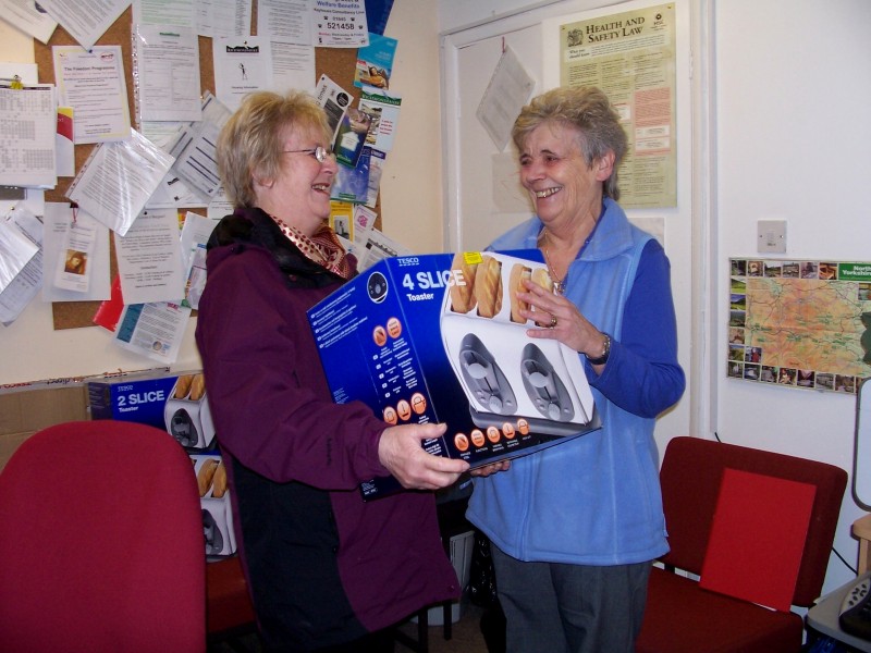 Maureen presenting Noreen with the gifts